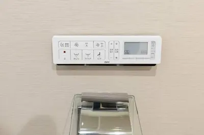 a white object is hanging on a wall at Harebare apartment for max 3ppl 3mins walk from Kiba station 2F in Tokyo