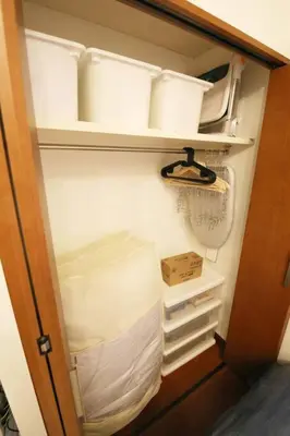 a refrigerator with its door open with some whiteentials at Gaia Kabukicho 301 \u30ac\u30a4\u30a2\u6b4c\u821e\u4f0e\u753a in Tokyo
