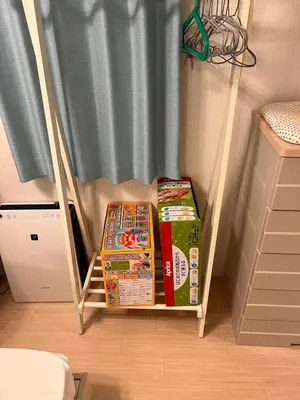 two boxes on a stand in front of a curtain at New! U&I Villa close Disney & Narita AP - Great View in Tokyo