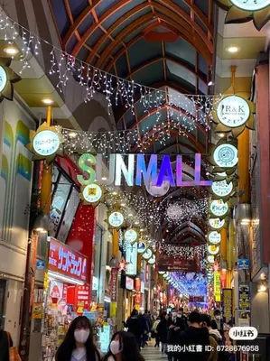 a street in a shopping mall with clocks and lights at Nakano 103 Walking 4 Mins Broadway Shinjuku 1 stop in Tokyo