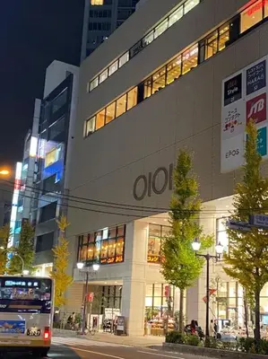 a bus is parked in front of a building at Nakano 103 Walking 4 Mins Broadway Shinjuku 1 stop in Tokyo