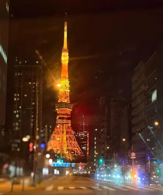 a view of the eiffel tower lit up at night at Spacious Tokyo Base near Tamachi station Hotel Ten Tamachi in Tokyo
