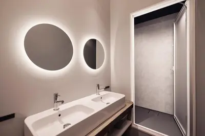 a white bathroom with two sinks and a mirror at Spacious Tokyo Base near Tamachi station Hotel Ten Tamachi in Tokyo