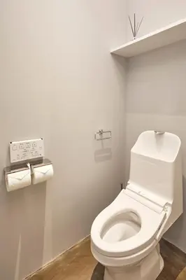 a bathroom with a white toilet in a room at Spacious Tokyo Base near Tamachi station Hotel Ten Tamachi in Tokyo