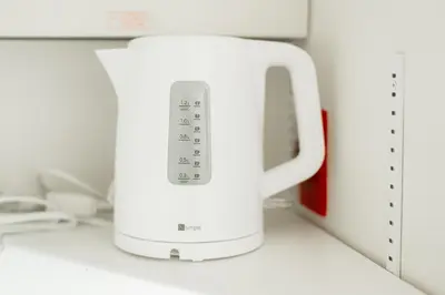 a white appliance sitting on top of a counter at Kiwami Hotel Shinjuku in Tokyo