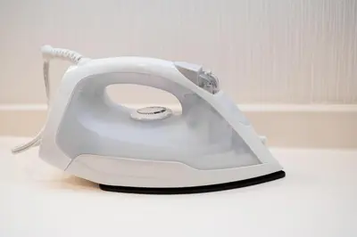 a white toaster sitting on top of a table at Mio Hotel Shinjuku Tokyo in Tokyo