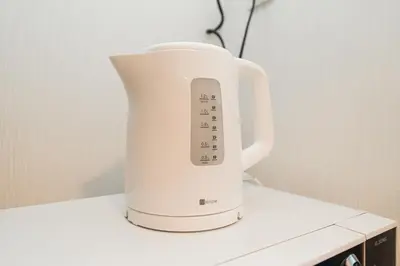a white blender sitting on top of a counter at Mio Hotel Shinjuku Tokyo in Tokyo