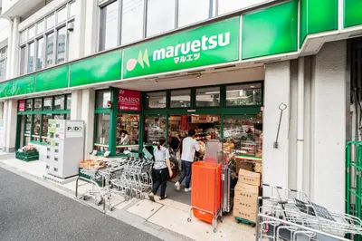 a store front of a store with people walking outside at \u6771\u4eac\u30ea\u30ea\u30a2\u30eb\u30db\u30c6\u30eb0401 in Tokyo