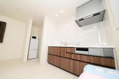 a kitchen with a sink and a refrigerator at NYHotel 1 \u65b0\u5bbf2\u968e\u5efa\u30664\u5ba41\u30d0\u30b9\u30eb\u30fc\u30e01\u30b7\u30e3\u30ef\u30fc2\u30c8\u30a4\u30ec in Tokyo