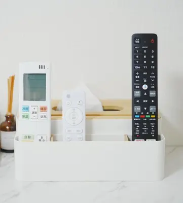 a remote control and other electronic devices on a table at \u6771\u4eac\u30ea\u30ea\u30a2\u30eb\u30db\u30c6\u30eb0501 in Tokyo
