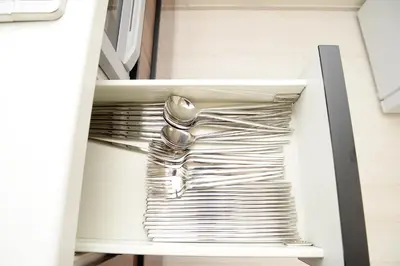 a stack of silver dishes in a refrigerator at NYHotel 3 \u65b0\u5bbf2\u968e\u5efa\u30663\u5ba41\u30d0\u30b9\u30eb\u30fc\u30e01\u30b7\u30e3\u30ef\u30fc2\u30c8\u30a4\u30ec in Tokyo