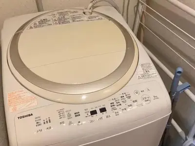 a white toilet with the lid up in a bathroom at \u30ec\u30ac\u30ea\u30a2\u30d2\u30eb\u30ba402 in Tokyo