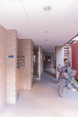 a bike parked in a hallway of a building at Sumida River 'Midori' APT in Tokyo