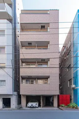 a car parked in front of a building at Sumida River 'Midori' APT in Tokyo