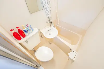 a bathroom with a toilet and a sink at \u65b0\u5bbf\u533a\u6b4c\u821e\u4f0e\u753a\u4f0a\u52bf\u4e39\u5f92\u6b653\u5206\u949f#6 in Tokyo