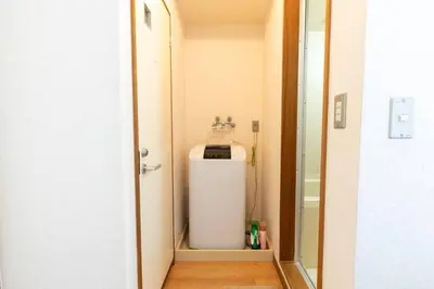 a small bathroom with a sink and a toilet at Minimalism Hotel Sumida 1 in Tokyo