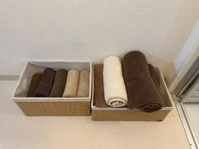 two wooden baskets with towels and towels at Tokyo Stay Nishishinjuku in Tokyo