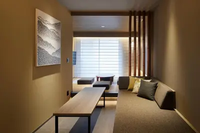 a living room with a couch and a table at Minn Asakusa Kuramae Station in Tokyo