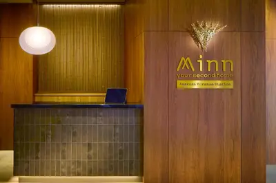 an amazon sign on a wall in a room at Minn Asakusa Kuramae Station in Tokyo
