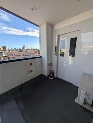 an empty room with a view of a city at incense\u4e0a\u91ce\u6839\u5cb89\uff26 in Tokyo