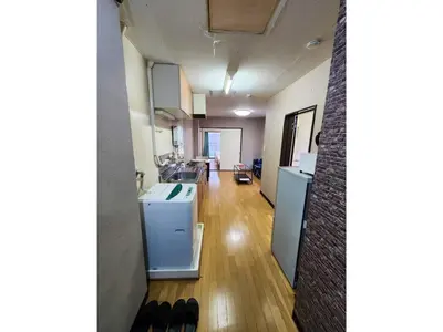 a room with a kitchen and a living room at Mamada Building - Vacation STAY 18001 in Tokyo