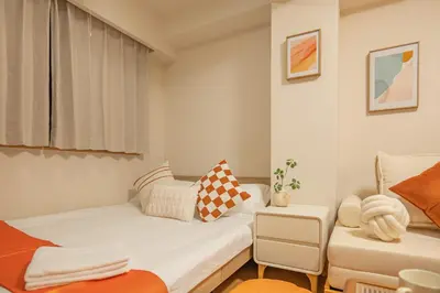 a small room with a bed and a chair at Higashi-Nakano 103 train 2 stops to Shinjuku ,up to 3 people in Tokyo