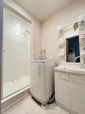 a white bathroom with a sink and a mirror at Year-end promotion 2 Gread location 1min to Station Closs Ueno Max 6 people Wi-fi unlimited in Tokyo