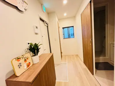 a room with a wooden counter and a hallway at Year-end promotion Free Wi-Fi spacious and bright Closs Ueno 1min to Minowa Sta Wide Room Max 4People in Tokyo