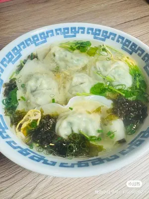 a bowl of soup with broccoli and mushrooms on a table at Year-end promotion Free Wi-Fi spacious and bright Closs Ueno 1min to Minowa Sta Wide Room Max 4People in Tokyo