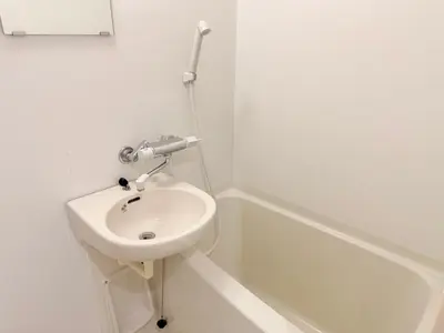 a white bathroom with a sink and a toilet at S5 Shibuya center-350m from Shibuya St ation in Tokyo