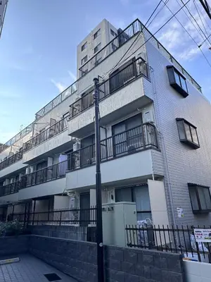 an apartment building with balconies on the side of it at Aakabane Apart ment 3 Wei hefuyan7190 in Tokyo