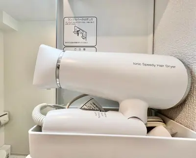 a white toilet in a bathroom with a sign on it at 君の家AOTO#Haneda&Narita Access#Free reserved parking in Tokyo