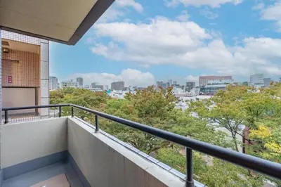 a balcony with a view of the city at Shinjuku Waseda Haruno B&B in Tokyo