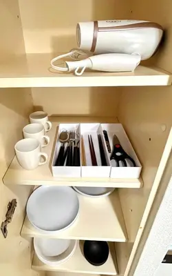 a cupboard filled with white plates and bowls at S,F, Heights - Vacation STAY 18008 in Tokyo