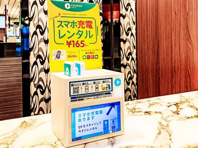 a sign on top of a machine on a counter at APA Hotel Akabane Iwabuchi Ekimae in Tokyo