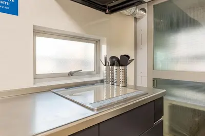 a kitchen with a sink and a window at \u6771\u65b0\u5bbf 1101 in Tokyo
