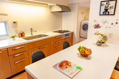 a kitchen with a sink and a counter top at Higashi-Shinjuku 905 in Tokyo