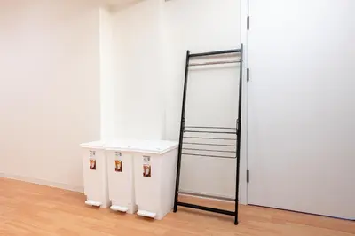 a mirror in a room with a white closet at \u6771\u65b0\u5bbf 1104 in Tokyo
