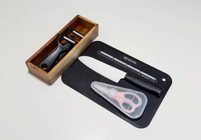 a pair of scissors in a wooden case at \u6771\u65b0\u5bbf 1104 in Tokyo