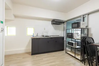 a kitchen with a sink and a counter top at \u6771\u65b0\u5bbf 1104 in Tokyo