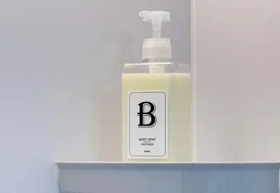 a bottle of soap sitting on top of a shelf at \u6771\u65b0\u5bbf 1108 in Tokyo