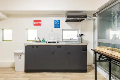 a kitchen with a sink and a counter top at Higashi-Shinjuku 1012 in Tokyo
