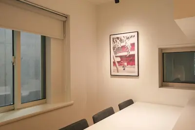 a room with a window and a table and chairs at URBAN HOUSE HATAGAYA - Vacation STAY 52809v in Tokyo