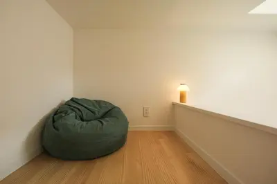 a room with a bean bag chair and a light at URBAN HOUSE HATAGAYA - Vacation STAY 52809v in Tokyo