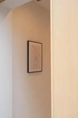 a drawing of a woman on a wall at URBAN HOUSE HATAGAYA - Vacation STAY 52809v in Tokyo