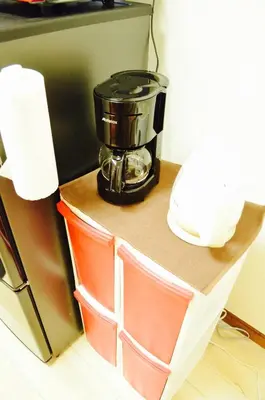 a coffee maker on a counter in a kitchen at Shibuya South JP House in Tokyo