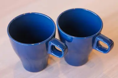 two blue cups sitting on top of a table at Harebare apartment for max 4ppl 3mins walk from Kiba station 5F in Tokyo