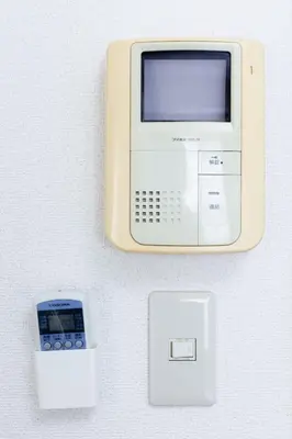 an old computer and a scale on a wall at \u30cf\u30a4\u30af\u30ec\u30b9\u30c8\u4e2d\u91ce202 in Tokyo