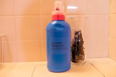 a blue water bottle sitting on top of a counter at #3 -\u30a8\u30af\u30bb\u30eb\u6a4b\u7acb101- Entire Unit in Tokyo