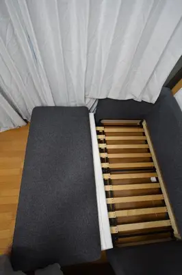 a close up of a bed in a bedroom at \u6587\u4eac\u533a\u8c4a\u5cf6\u533a\u5357\u5927\u585a1 in Tokyo
